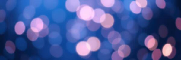 Soft bokeh lights create a dreamy atmosphere in a nighttime setting with colorful hues and sparkling effects photo