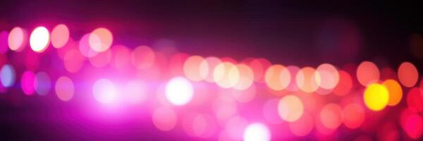 Colorful bokeh lights create a vibrant atmosphere during a night event in the city photo