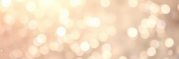 Shimmering golden bokeh effect creating an enchanting atmosphere at a festive gathering during evening hours photo