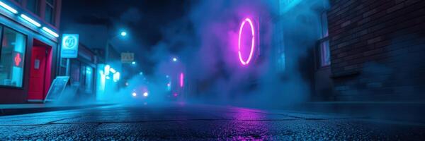 Vivid neon lights illuminate a deserted street shrouded in mist during a quiet nighttime atmosphere photo
