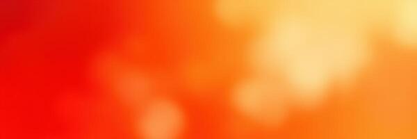 Bright orange and yellow abstract background with soft bokeh dots creating a warm atmosphere in the image photo