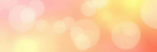 Beautiful warm bokeh background with soft glowing light in a gradient of orange and yellow hues photo