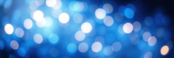 Abstract blue bokeh background with soft circles of light blending together in a tranquil and dreamy atmosphere photo