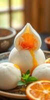 Soft bao buns with flowing egg yolk and orange slices on a decorative plate during a warm afternoon setting photo