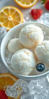 Refreshing bowl of creamy ice cream with fresh fruits on ice during a sunny day photo