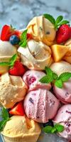 Colorful assortment of homemade ice cream served with fresh fruits and mint leaves in sunlight photo