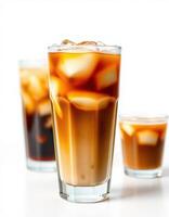Refreshing iced coffee drinks presented in tall and short glasses with ice for a cooling beverage experience photo