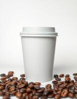 Freshly roasted coffee beans surround a blank takeaway cup on a clean white background photo