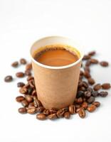 Warm cup of coffee surrounded by fresh coffee beans on a light background in a cozy setting photo