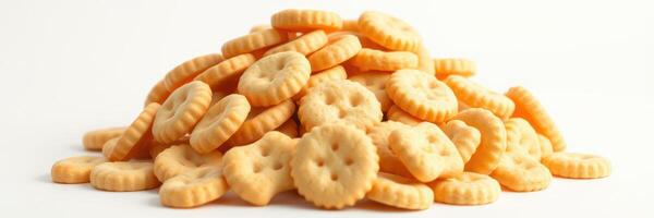 Pile of round, button-shaped crackers arranged artfully on a white background, showcasing texture and detail photo