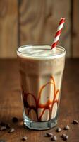 Delicious chocolate milkshake served in a glass with a striped straw and drizzled chocolate sauce photo
