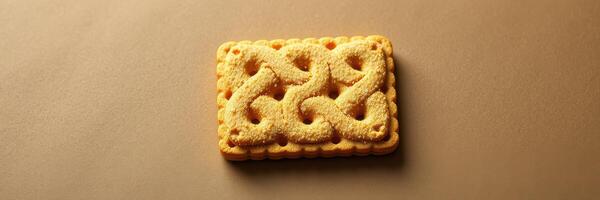 Sweet, intricate biscuit displayed on a smooth surface with warm lighting and detailed patterns in focus photo
