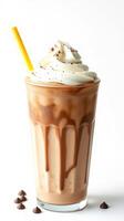 Delicious chocolate milkshake topped with whipped cream and chocolate drizzle served in a tall glass photo