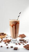 Creamy chocolate milkshake garnished with chocolate drizzle on a bright white background photo