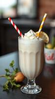 Creamy lemon dessert drink served in a tall glass with colorful straws and garnished with lemon slice in a cozy setting photo