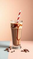 Delicious chocolate milkshake topped with whipped cream and a red striped straw in a minimalist setting photo