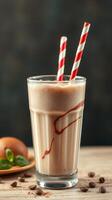 Creamy coffee shake served in a glass with striped straws perfect for indulgent afternoons at home photo