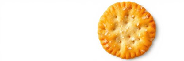 Delicious round cracker with salted texture on a white background in a minimalist setting perfect for snacking photo