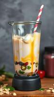 Health-focused smoothie preparation with fresh fruits and yogurt in a blender photo
