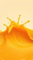 Bright orange liquid splash creating dynamic waves against a soft yellow background photo