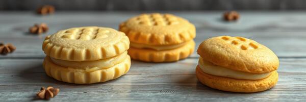 Homemade cookies arranged on a wooden table with warm lighting and decorative spices photo