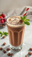 Refreshing iced chocolate drink topped with mint and coffee beans in a stylish glass photo
