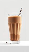Creamy chocolate milkshake served in a tall glass with a striped straw and a sprinkle of cocoa powder photo