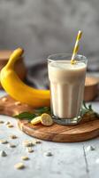 Creamy banana smoothie served on a wooden board with fresh banana slices and oats in a modern kitchen setting photo