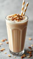 Delicious oat-based smoothie with crunchy toppings served in a tall glass during afternoon light photo