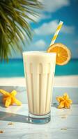Refreshing tropical beverage with lemon and starfruit on a sunny beach photo