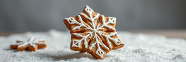 Gingerbread snowflake cookies decorated with icing on powdered sugar photo