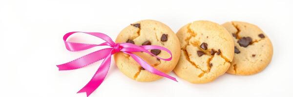 Delightful chocolate chip cookies with a pink ribbon perfect for gifting or celebrations photo