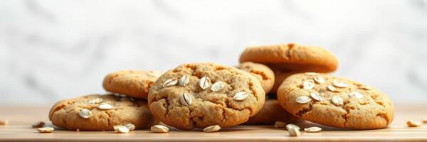Cookies with oats arranged on a wooden surface against a light background inviting a cozy atmosphere for baking photo