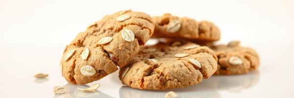 Freshly baked oatmeal cookies on a white surface, tempting and deliciously soft photo