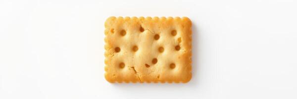 Simple biscuit placed on a clean white surface highlighting the texture and color, perfect for snacks or desserts photo