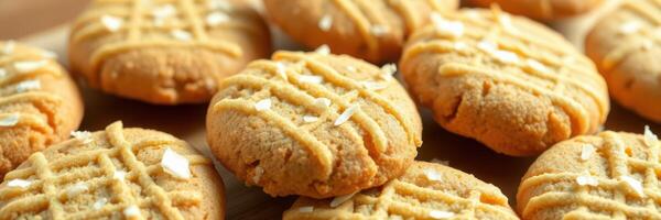 Freshly baked peanut butter cookies topped with shredded coconut ready for serving in a cozy kitchen photo
