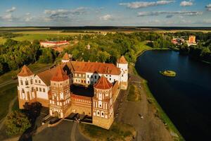 View from the height of the medieval MIR Castle in sunny summer weather photo