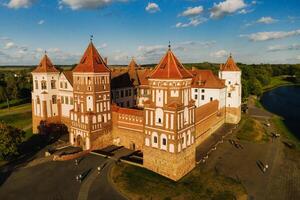 View from the height of the medieval MIR Castle in sunny summer weather photo