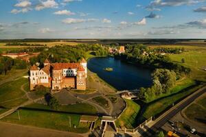 View from the height of the medieval MIR Castle in sunny summer weather photo