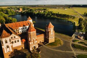 View from the height of the medieval MIR Castle in sunny summer weather photo