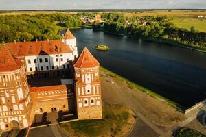 View from the height of the medieval MIR Castle in sunny summer weather photo