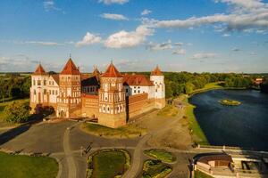 View from the height of the medieval MIR Castle in sunny summer weather photo