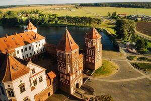 View from the height of the medieval MIR Castle in sunny summer weather photo