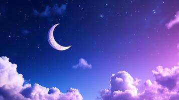 A crescent and moon in the sky with clouds photo