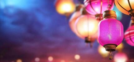 Many colorful lanterns hanging from a string photo