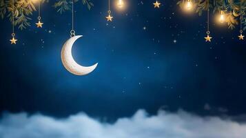 A moon and stars hanging from the sky photo