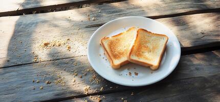 A plate with two slices of toast on it photo