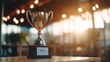 A trophy on a table in front of a window photo