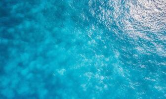 An aerial view of the ocean from above photo