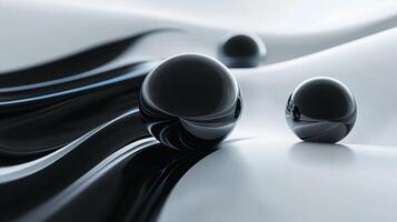 Three black spheres on a white background. The spheres are arranged in a way that they appear to be floating on a surface, creating a sense of movement and fluidity photo